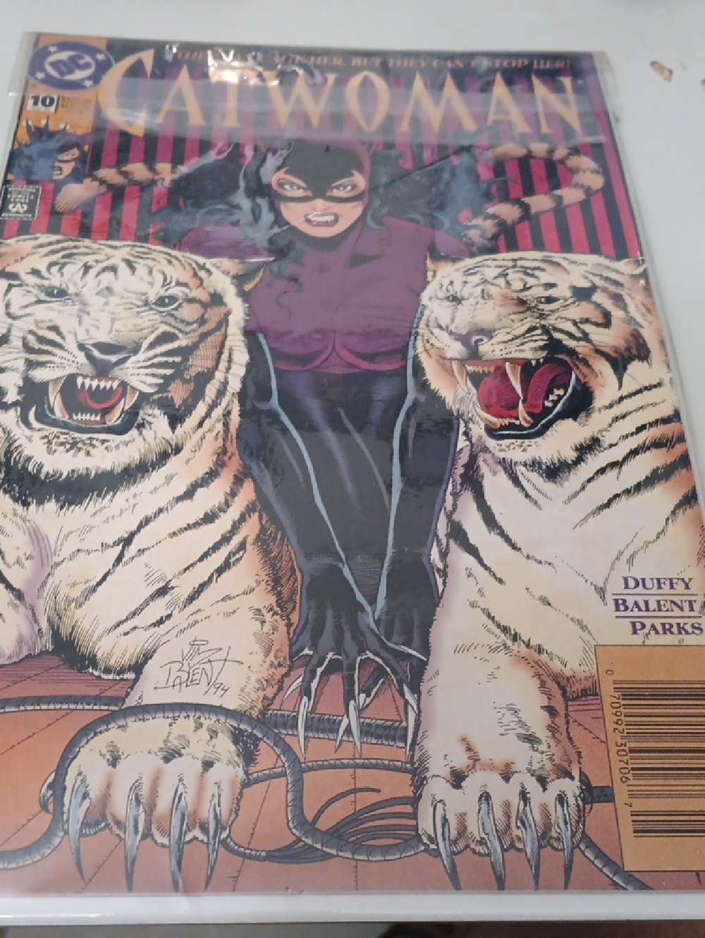 2x DC Catwoman Cover with Purple Costume and White Tigers